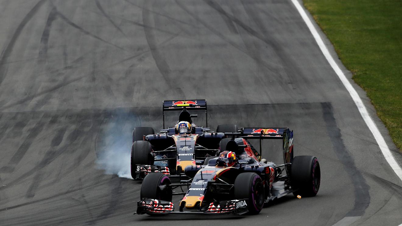 Daniil Kvyat (RUS) Scuderia Toro Rosso STR11 and Carlos Sainz jr (ESP) Scuderia Toro Rosso STR11 locks up at Formula One World Championship, Rd7, Canadian Grand Prix, Race, Montreal, Canada, Sunday 12 June 2016. © Sutton Images