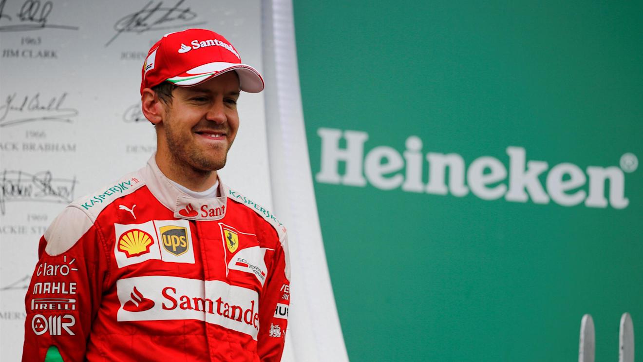 Sebastian Vettel (GER) Ferrari celebrates on the podium at Formula One World Championship, Rd7, Canadian Grand Prix, Race, Montreal, Canada, Sunday 12 June 2016. © Sutton Images