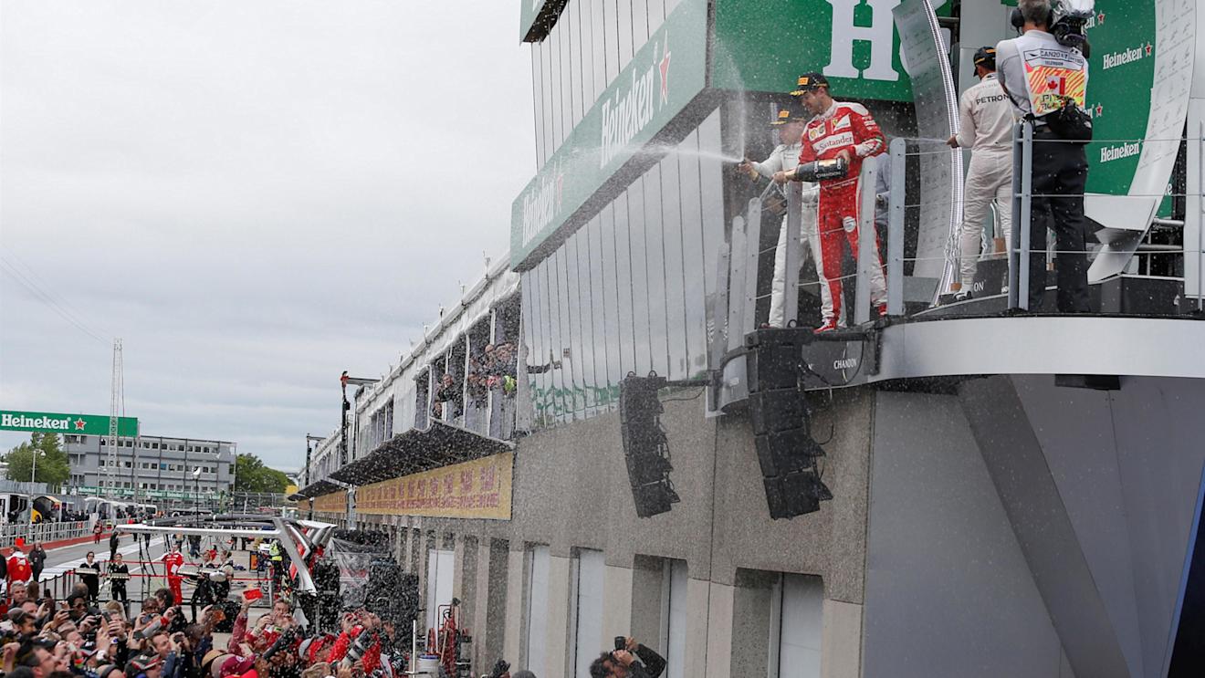 Valtteri Bottas (FIN) Williams, Race winner Lewis Hamilton (GBR) Mercedes AMG F1 and Sebastian Vettel (GER) Ferrari celebrate on the podium with the champagne at Formula One World Championship, Rd7, Canadian Grand Prix, Race, Montreal, Canada, Sunday 12 June 2016. © Sutton Images