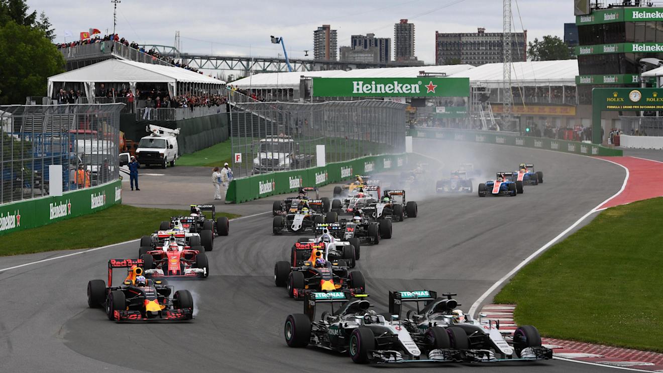 Nico Rosberg (GER) Mercedes-Benz F1 W07 Hybrid and Lewis Hamilton (GBR) Mercedes-Benz F1 W07 Hybrid battle at the start of the race at Formula One World Championship, Rd7, Canadian Grand Prix, Race, Montreal, Canada, Sunday 12 June 2016. © Sutton Images
