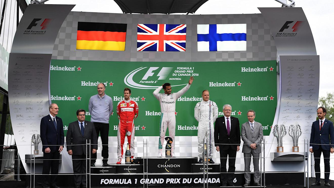 (L to R): Evan Short (GBR) Mercedes AMG F1, Sebastian Vettel (GER) Ferrari, Lewis Hamilton (GBR) Mercedes AMG F1 and Valtteri Bottas (FIN) Williams celebrate on the podium at Formula One World Championship, Rd7, Canadian Grand Prix, Race, Montreal, Canada, Sunday 12 June 2016. © Sutton Images