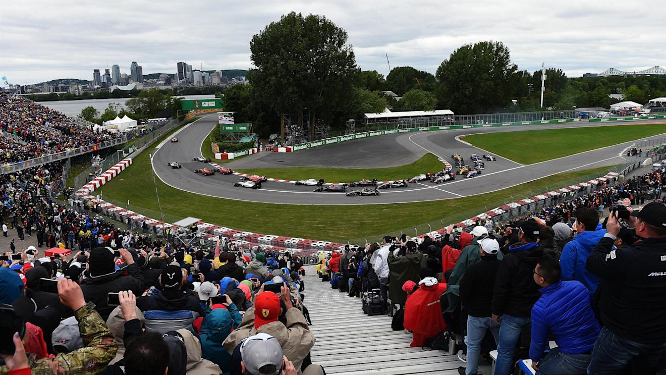 Sebastian Vettel (GER) Ferrari SF16-H leads at the start of the race as Nico Rosberg (GER) Mercedes-Benz F1 W07 Hybrid runs wide at Formula One World Championship, Rd7, Canadian Grand Prix, Race, Montreal, Canada, Sunday 12 June 2016. © Sutton Images