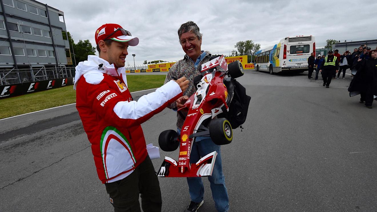 Sebastian Vettel (GER) Ferrari with fan and Ferrari F1 car hat at Formula One World Championship, Rd7, Canadian Grand Prix, Preparations, Montreal, Canada, Thursday 9 June 2016. © Sutton Images