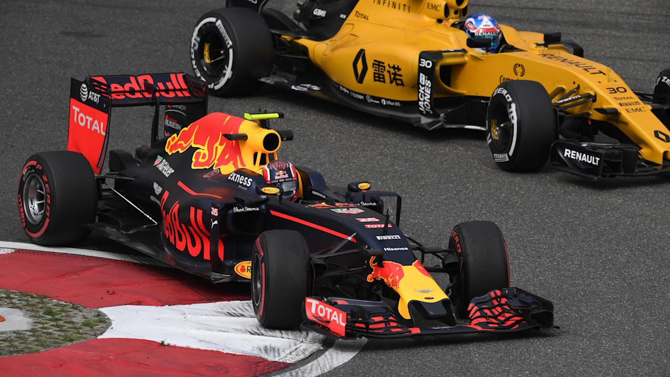 Daniil Kvyat (RUS) Red Bull Racing RB12 with Jolyon Palmer (GBR) Renault Sport F1 Team RS16 battle at Formula One World Championship, Rd3, Chinese Grand Prix, Practice, Shanghai, China, Friday 15 April 2016. © Sutton Motorsport Images