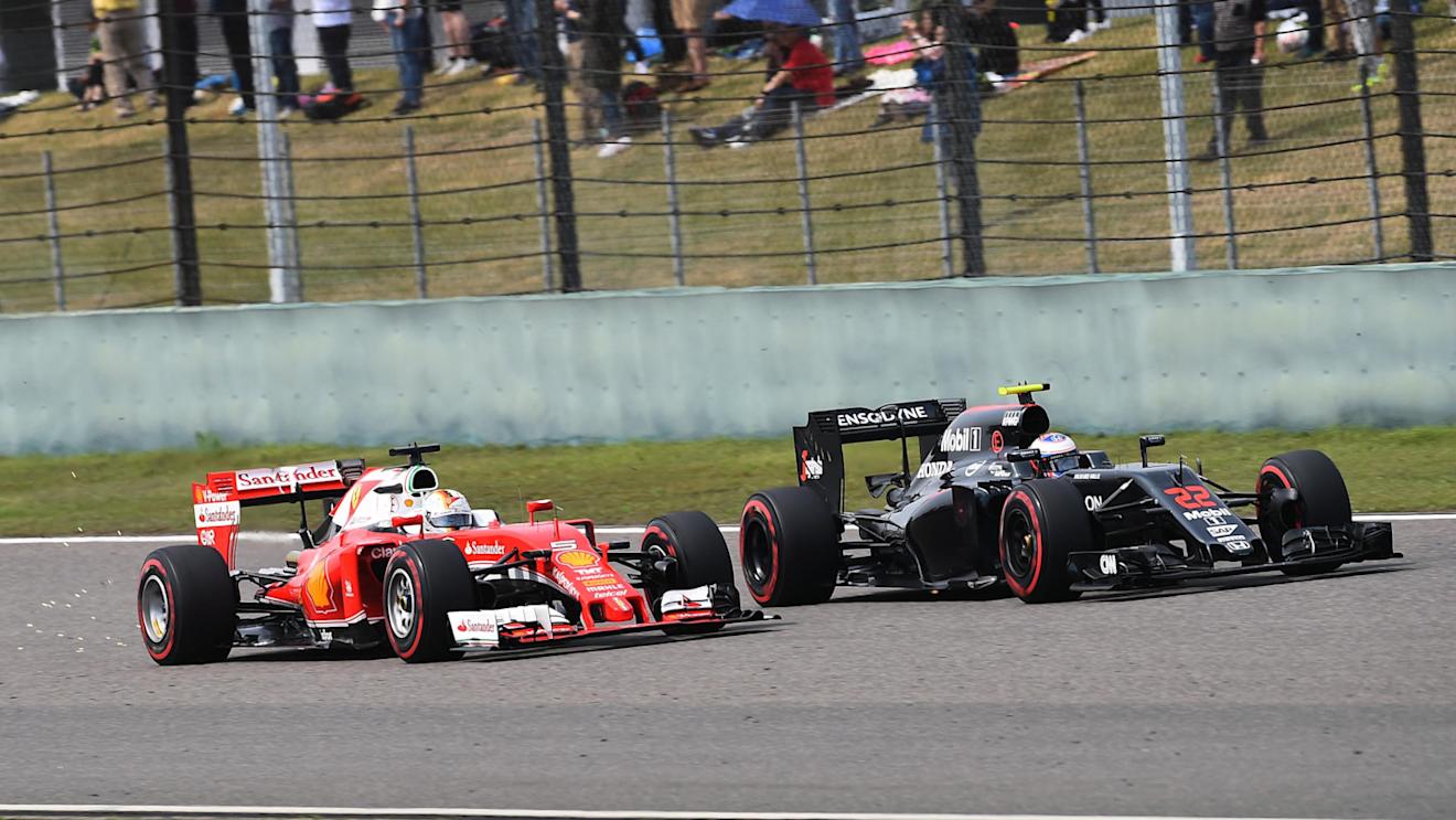 Sebastian Vettel (GER) Ferrari SF16-H and Fernando Alonso (ESP) McLaren MP4-31 battle at Formula One World Championship, Rd3, Chinese Grand Prix, Race, Shanghai, China, Sunday 17 April 2016. © Sutton Motorsport Images