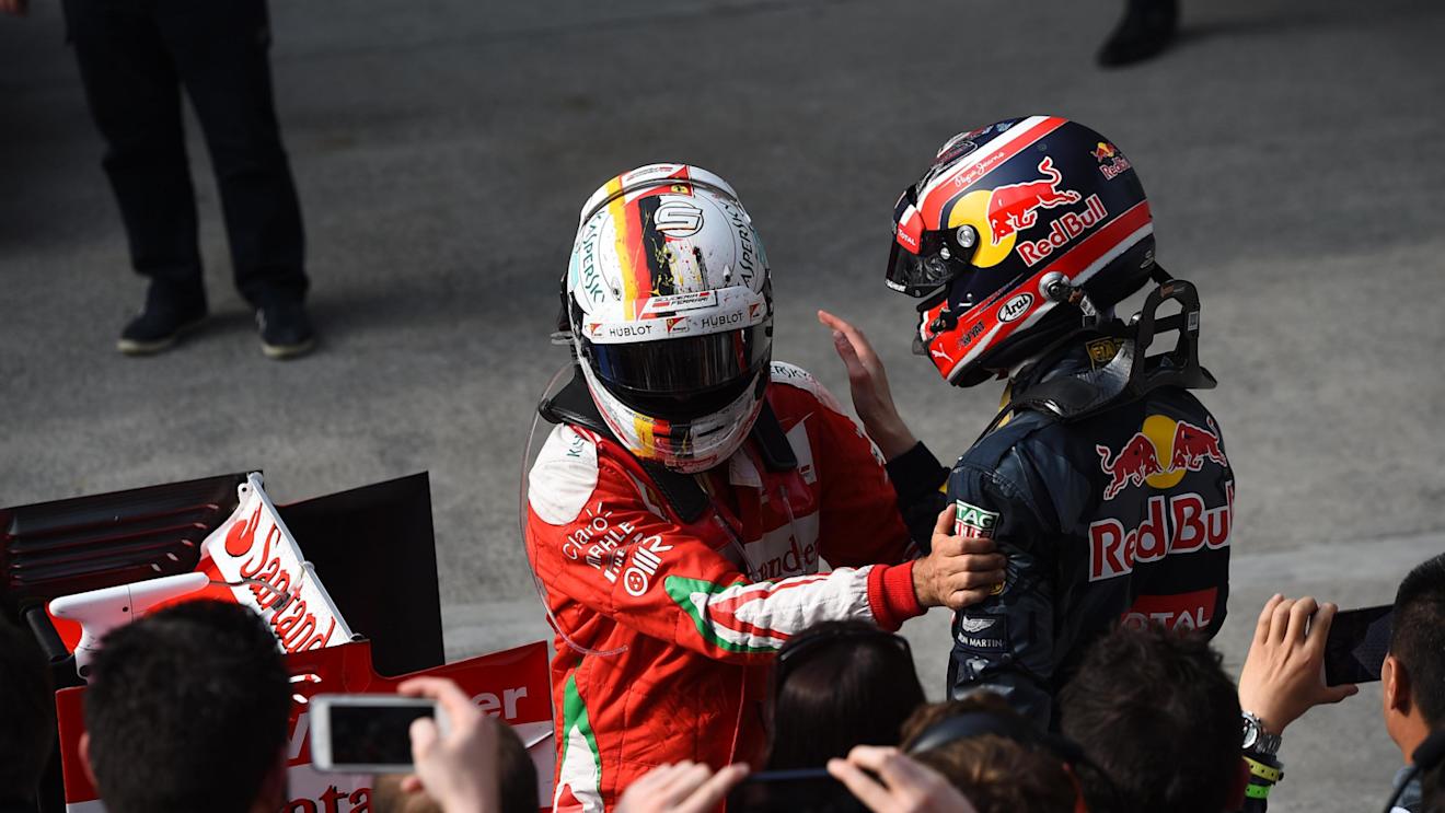 Sebastian Vettel (GER) Ferrari celebrates in parc ferme with Daniil Kvyat (RUS) Red Bull Racing at Formula One World Championship, Rd3, Chinese Grand Prix, Race, Shanghai, China, Sunday 17 April 2016. © Sutton Motorsport Images
