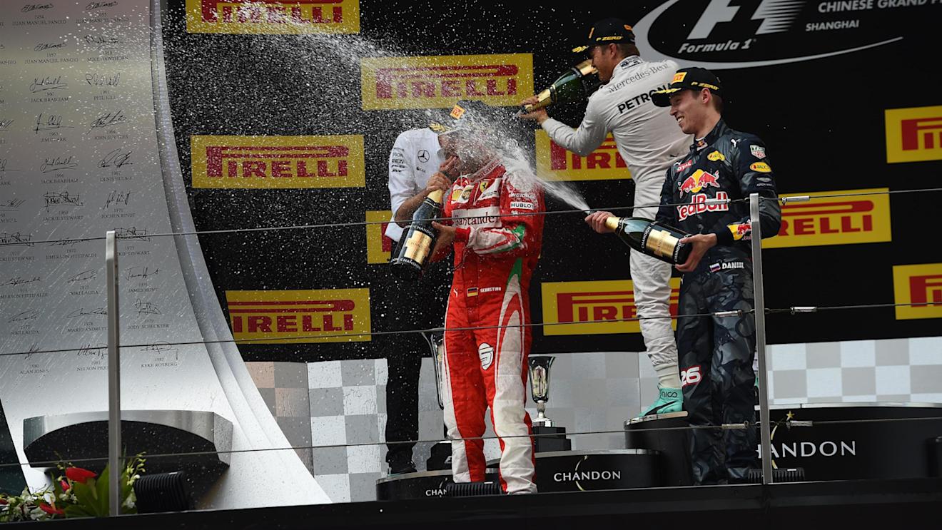 Tony Ross (GBR) Mercedes AMG F1 Race Engineer, Nico Rosberg (GER) Mercedes AMG F1, Sebastian Vettel (GER) Ferrari and Daniil Kvyat (RUS) Red Bull Racing celebrate on the podium with the champagne at Formula One World Championship, Rd3, Chinese Grand Prix, Race, Shanghai, China, Sunday 17 April 2016. © Sutton Motorsport Images