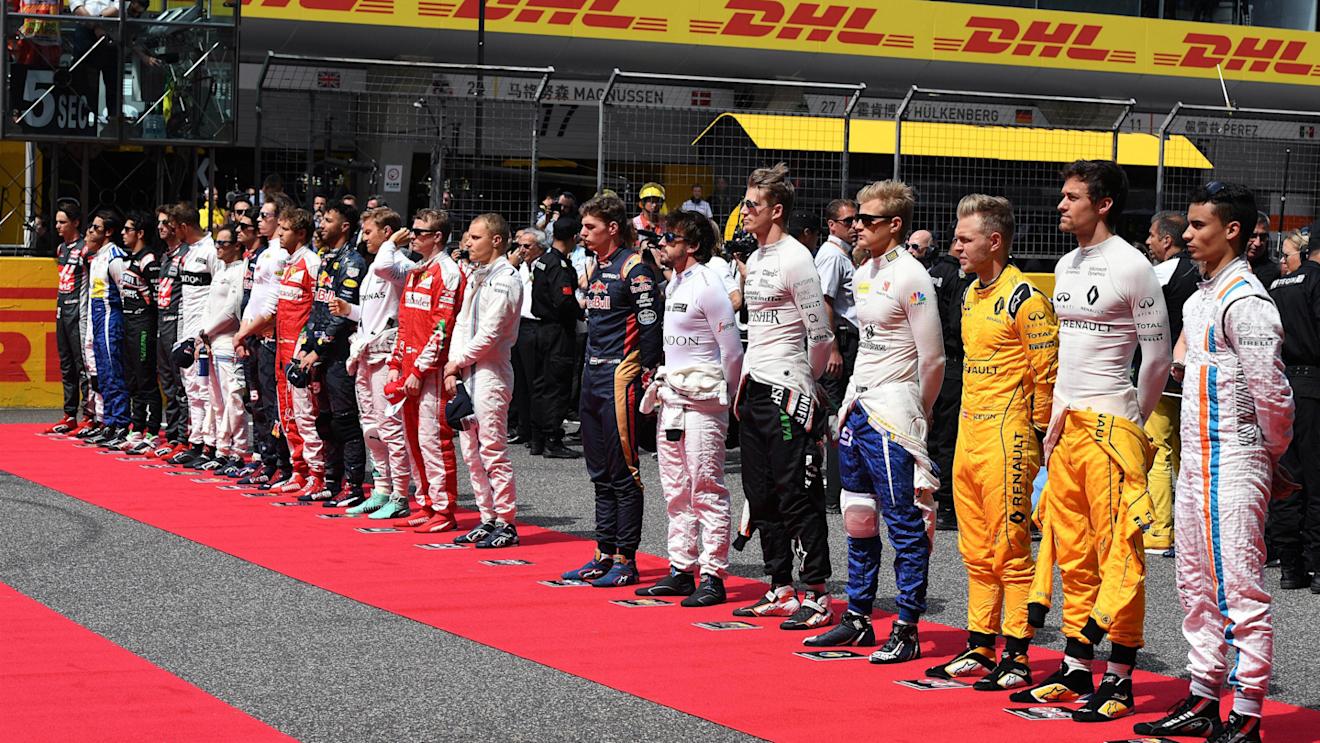 Drivers observe the Natioanal Anthem on the grid at Formula One World Championship, Rd3, Chinese Grand Prix, Race, Shanghai, China, Sunday 17 April 2016. © Sutton Motorsport Images