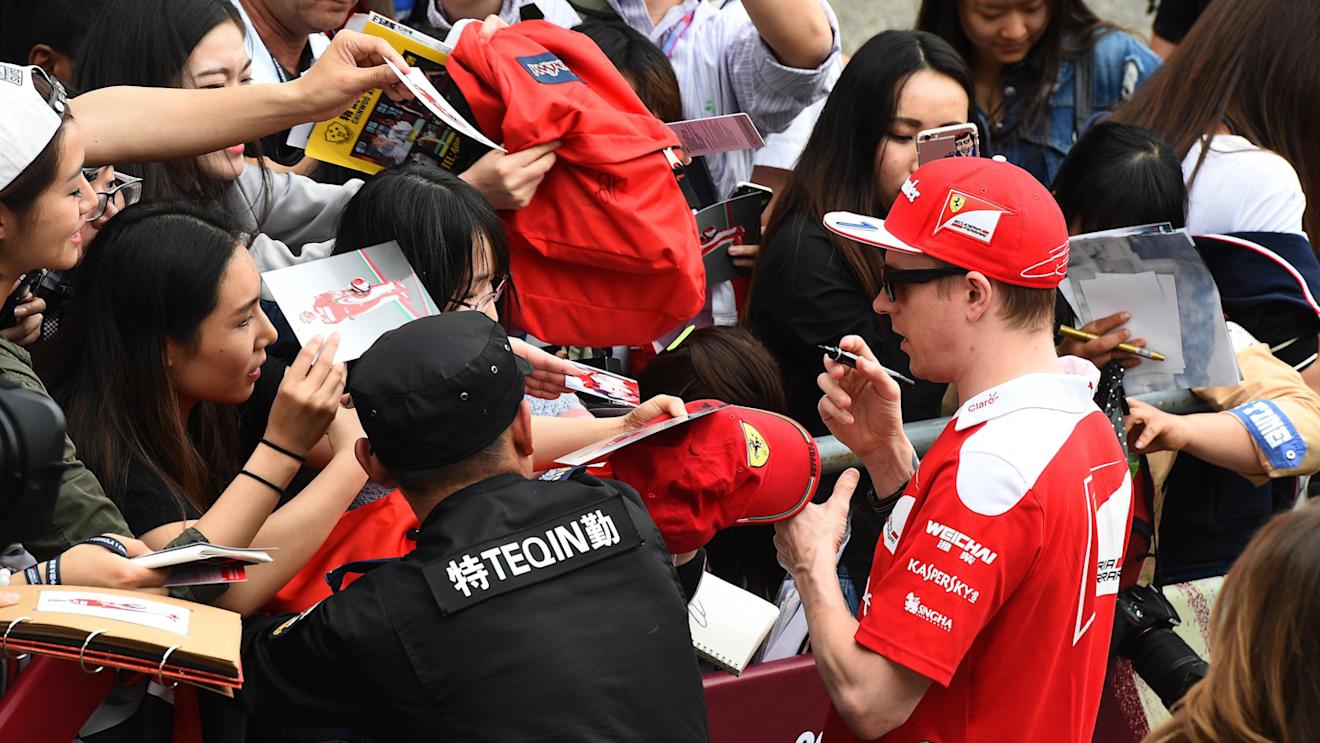 Kimi Raikkonen (FIN) Ferrari signs autographs for the fans at Formula One World Championship, Rd3, Chinese Grand Prix, Preparations, Shanghai, China, Thursday 14 April 2016. © Sutton Motorsport Images