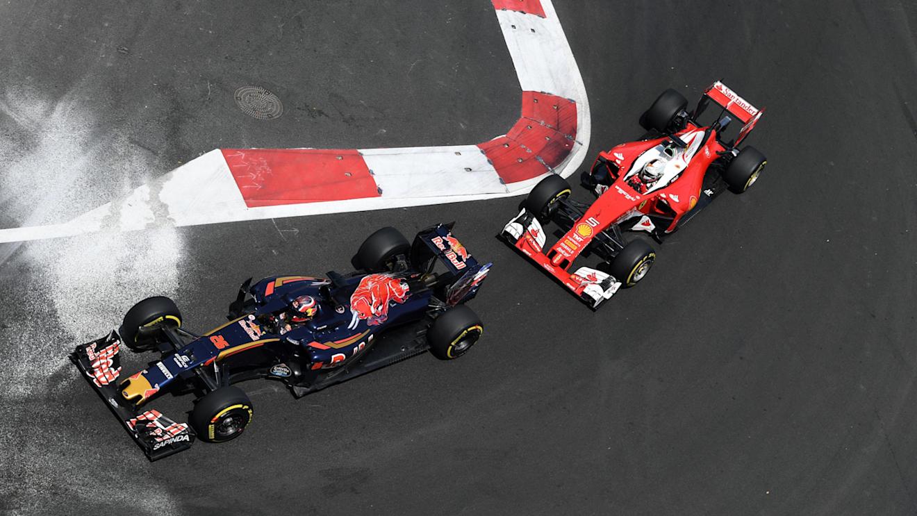 Daniil Kvyat (RUS) Scuderia Toro Rosso STR11 and Sebastian Vettel (GER) Ferrari SF16-H at Formula One World Championship, Rd8, European Grand Prix, Qualifying, Baku City Circuit, Baku, Azerbaijan, Saturday 18 June 2016. © Sutton Images