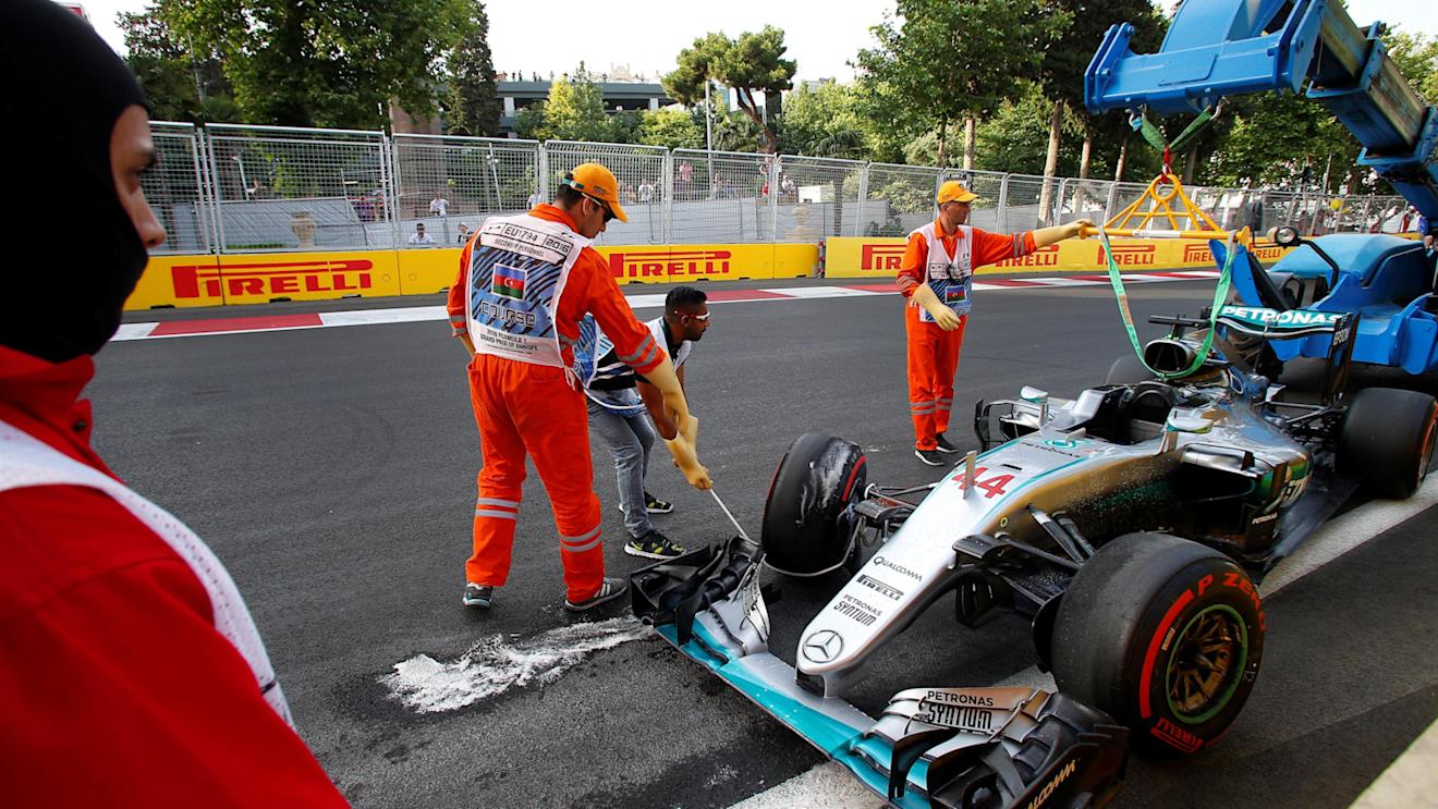 The car of Lewis Hamilton (GBR) Mercedes-Benz F1 W07 Hybrid is recovered by the marshals after crashing in Q3 at Formula One World Championship, Rd8, European Grand Prix, Qualifying, Baku City Circuit, Baku, Azerbaijan, Saturday 18 June 2016. © Sutton Images