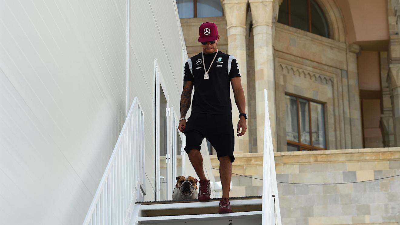 Lewis Hamilton (GBR) Mercedes AMG F1 with his dog Coco at Formula One World Championship, Rd8, European Grand Prix, Preparations, Baku City Circuit, Baku, Azerbaijan, Thursday 16 June 2016. © Sutton Images