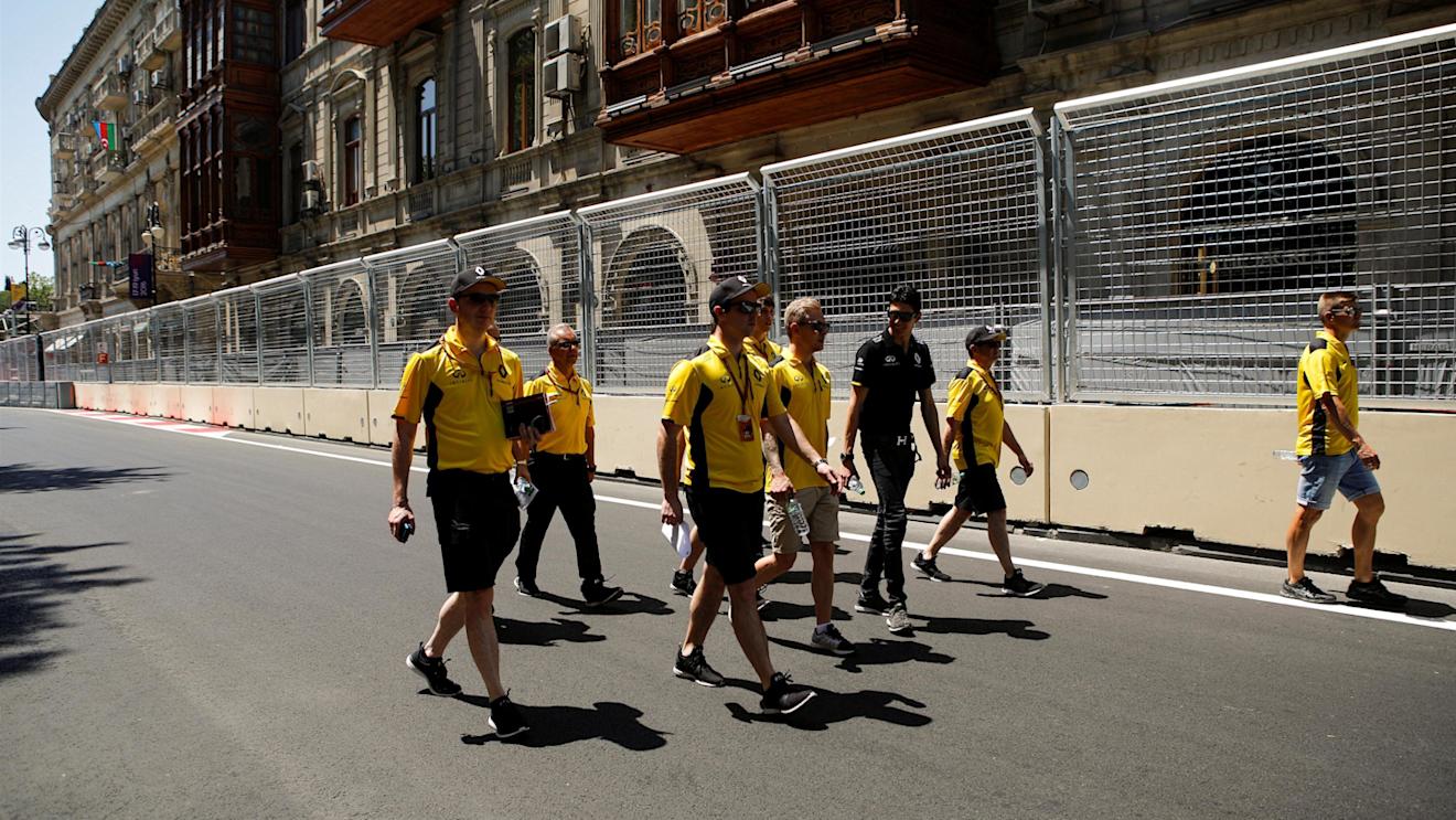 Kevin Magnussen (DEN) Renault Sport F1 Team and Esteban Ocon (FRA) Renault Sport F1 Team walk the track at Formula One World Championship, Rd8, European Grand Prix, Preparations, Baku City Circuit, Baku, Azerbaijan, Thursday 16 June 2016. © Sutton Images