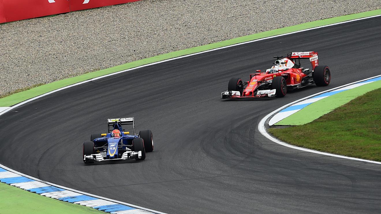 Felipe Nasr (BRA) Sauber C35 and Sebastian Vettel (GER) Ferrari SF16-H at Formula One World Championship, Rd12, German Grand Prix, Practice, Hockenheim, Germany, Friday 29 July 2016. © Sutton Images