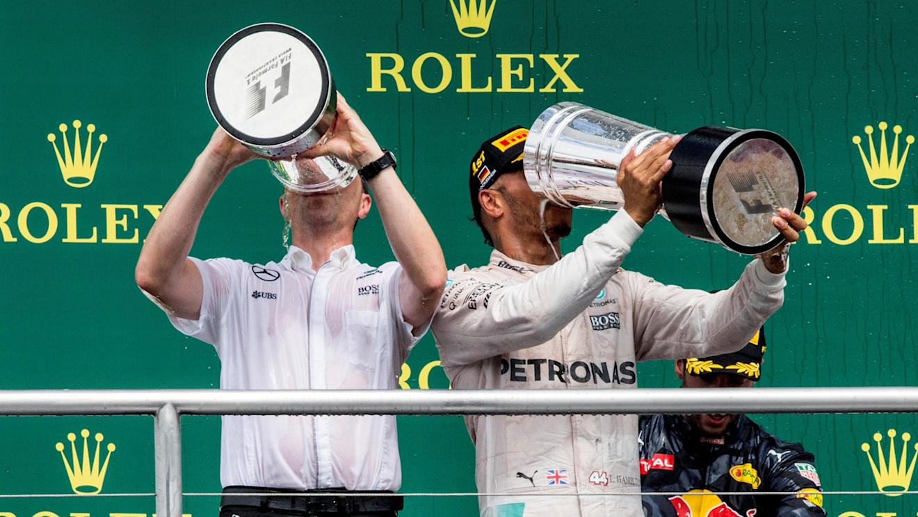 Race winner Lewis Hamilton (GBR) Mercedes AMG F1 celebrates on the podium with the champagne and the trophy at Formula One World Championship, Rd12, German Grand Prix, Race, Hockenheim, Germany, Sunday 31 July 2016. © Sutton Images