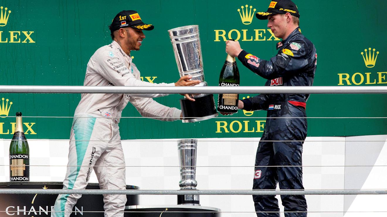 Race winner Lewis Hamilton (GBR) Mercedes AMG F1 and Max Verstappen (NED) Red Bull Racing celebrate on the podium with the champagne and the trophy at Formula One World Championship, Rd12, German Grand Prix, Race, Hockenheim, Germany, Sunday 31 July 2016. © Sutton Images