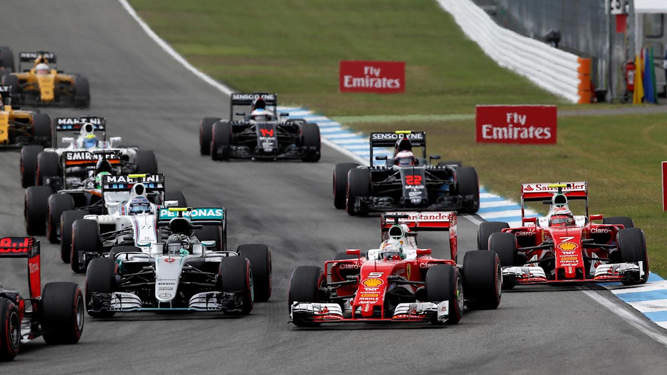 Nico Rosberg (GER) Mercedes-Benz F1 W07 Hybrid, Sebastian Vettel (GER) Ferrari SF16-H and Kimi Raikkonen (FIN) Ferrari SF16-H at the start of the race at Formula One World Championship, Rd12, German Grand Prix, Race, Hockenheim, Germany, Sunday 31 July 2016. © Sutton Images