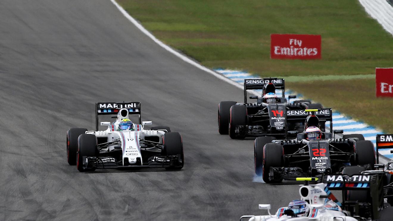 Felipe Massa (BRA) Williams FW38 and Jenson Button (GBR) McLaren MP4-31 battle at Formula One World Championship, Rd12, German Grand Prix, Race, Hockenheim, Germany, Sunday 31 July 2016. © Sutton Images