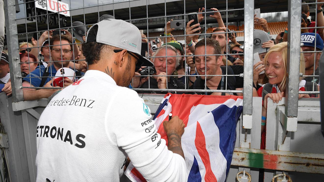 Lewis Hamilton (GBR) Mercedes AMG F1 celebrates with the fans at Formula One World Championship, Rd12, German Grand Prix, Race, Hockenheim, Germany, Sunday 31 July 2016. © Sutton Images