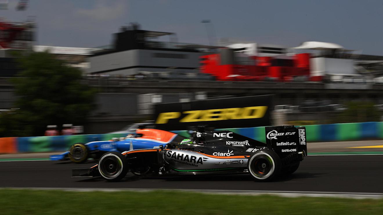 Nico Hulkenberg (GER) Force India VJM09 and Pascal Wehrlein (GER) Manor Racing MRT05 at Formula One World Championship, Rd11, Hungarian Grand Prix, Qualifying, Hungaroring, Hungary, Saturday 23 July 2016. © Sutton Images