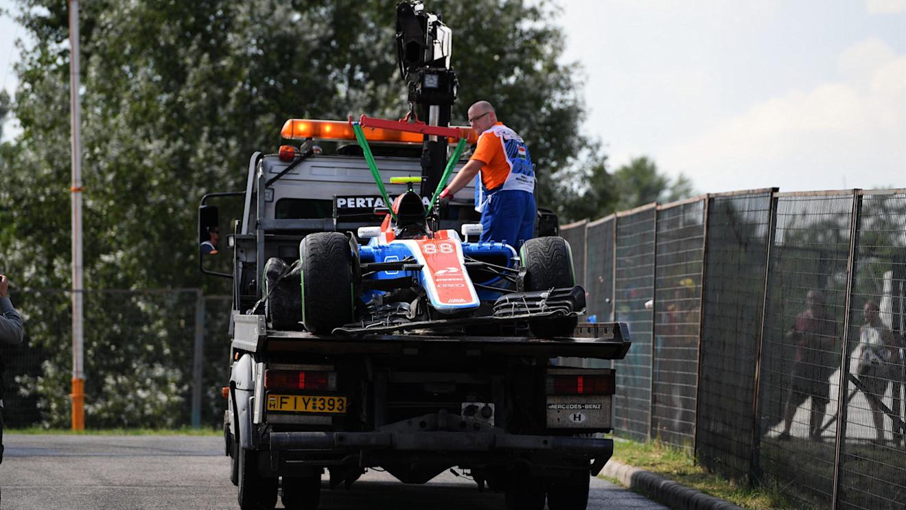 The crashed car of Rio Haryanto (IDN) Manor Racing MRT05 is recovered in Q1 at Formula One World Championship, Rd11, Hungarian Grand Prix, Qualifying, Hungaroring, Hungary, Saturday 23 July 2016. © Sutton Images