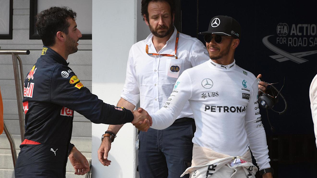 Daniel Ricciardo (AUS) Red Bull Racing and Lewis Hamilton (GBR) Mercedes AMG F1 celebrate in parc ferme at Formula One World Championship, Rd11, Hungarian Grand Prix, Qualifying, Hungaroring, Hungary, Saturday 23 July 2016. © Sutton Images