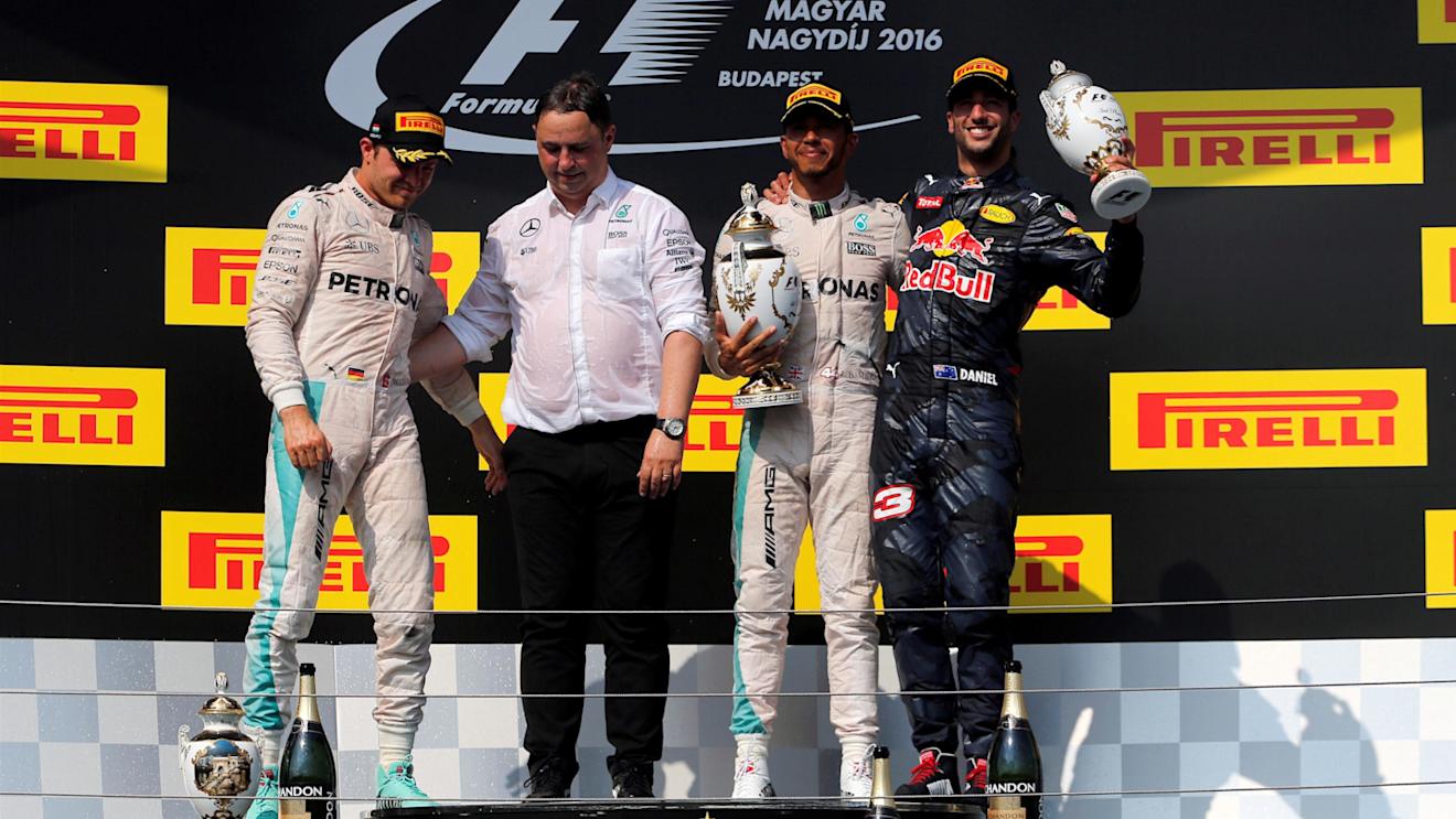 (L to R): Nico Rosberg (GER) Mercedes AMG F1, Ron Meadows (GBR) Mercedes AMG F1 Team Manager, race winner Lewis Hamilton (GBR) Mercedes AMG F1 and Daniel Ricciardo (AUS) Red Bull Racing celebrate on the podium with the trophies at Formula One World Championship, Rd11, Hungarian Grand Prix, Race, Hungaroring, Hungary, Sunday 24 July 2016. © Sutton Images