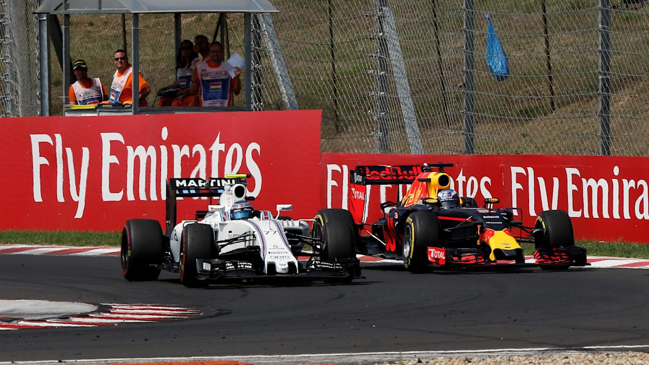 Valtteri Bottas (FIN) Williams FW38 and Daniel Ricciardo (AUS) Red Bull Racing RB12 battle at Formula One World Championship, Rd11, Hungarian Grand Prix, Race, Hungaroring, Hungary, Sunday 24 July 2016. © Sutton Images