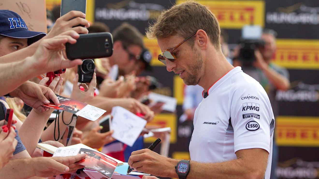 Jenson Button (GBR) McLaren signs autographs for the fans at Formula One World Championship, Rd11, Hungarian Grand Prix, Race, Hungaroring, Hungary, Sunday 24 July 2016. © Sutton Images