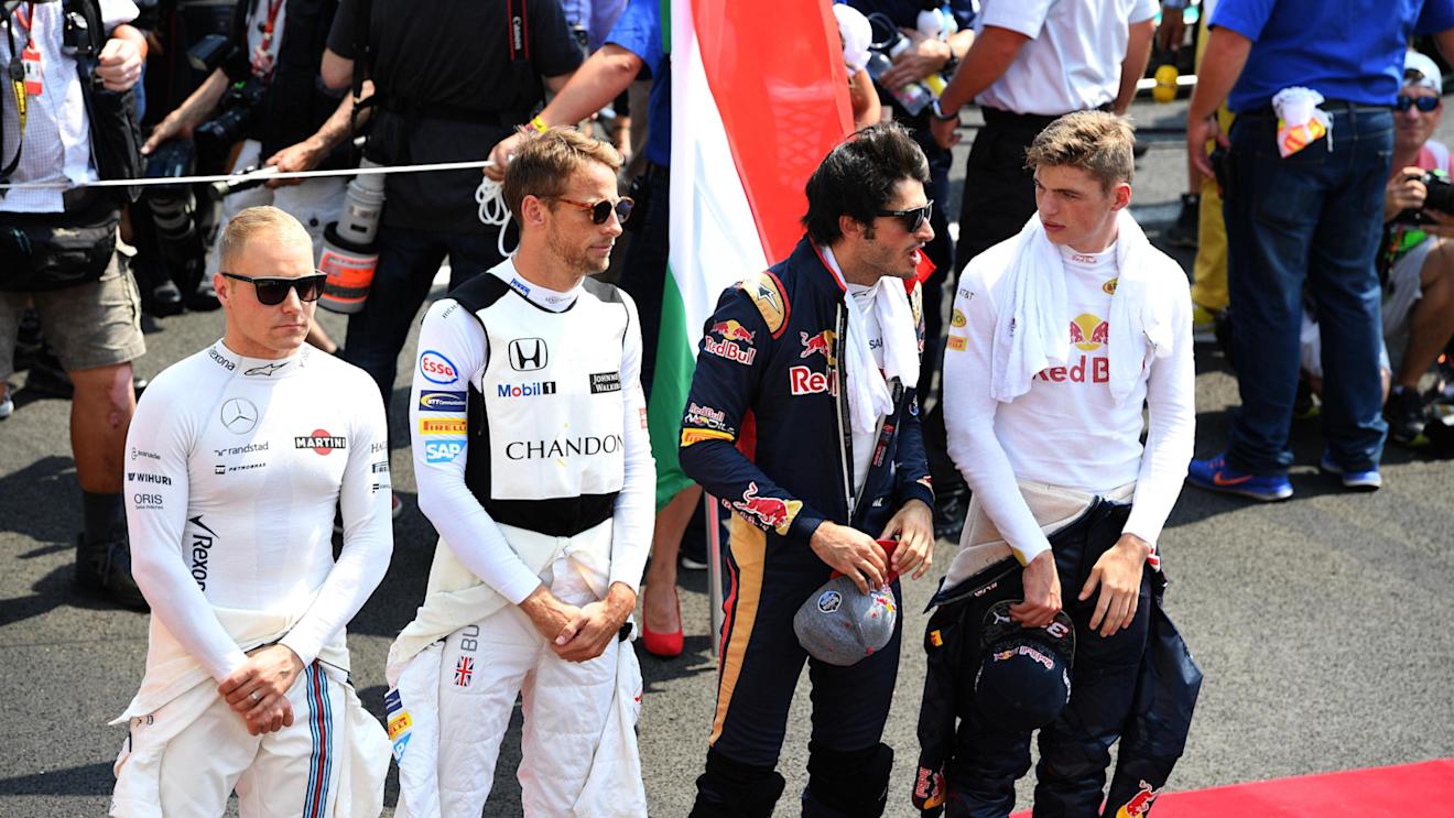 Drivers observe the National Anthem on the grid at Formula One World Championship, Rd11, Hungarian Grand Prix, Race, Hungaroring, Hungary, Sunday 24 July 2016. © Sutton Images