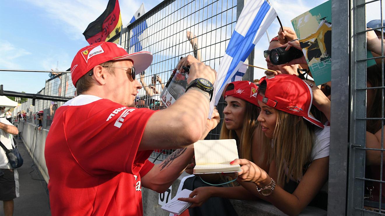 Kimi Raikkonen (FIN) Ferrari signs autographs for the fans at Formula One World Championship, Rd11, Preparations, Hungaroring, Hungary, Thursday 21 July 2016. © Sutton Images