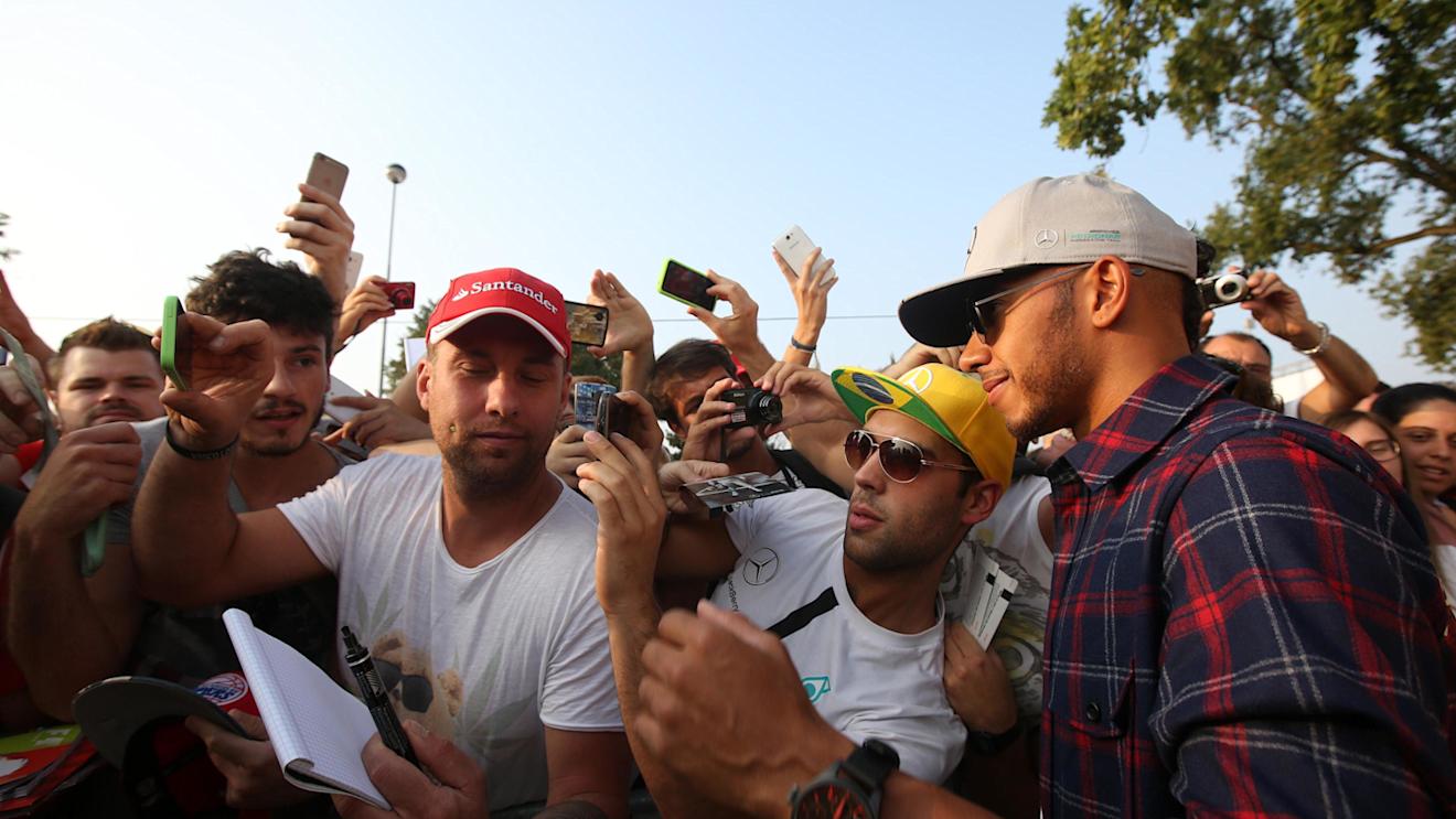 Lewis Hamilton (GBR) Mercedes AMG F1 signs autographs for the fans at Formula One World Championship, Rd14, Italian Grand Prix, Practice, Monza, Italy, Friday 2 September 2016. © Sutton Images