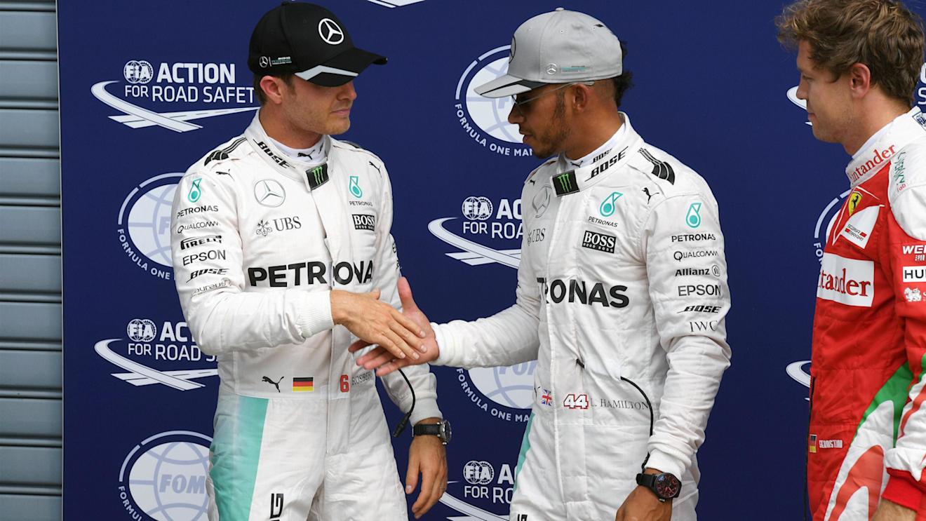 Pole sitter Lewis Hamilton (GBR) Mercedes AMG F1 and Nico Rosberg (GER) Mercedes AMG F1 celebrate in parc ferme at Formula One World Championship, Rd14, Italian Grand Prix, Qualifying, Monza, Italy, Saturday 3 September 2016. © Sutton Images