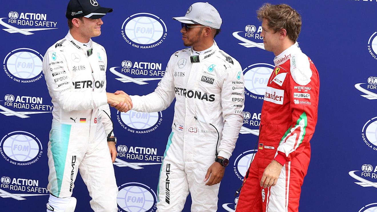 Nico Rosberg (GER) Mercedes AMG F1, Lewis Hamilton (GBR) Mercedes AMG F1 and Sebastian Vettel (GER) Ferrari in parc ferme at Formula One World Championship, Rd14, Italian Grand Prix, Qualifying, Monza, Italy, Saturday 3 September 2016. © Sutton Images
