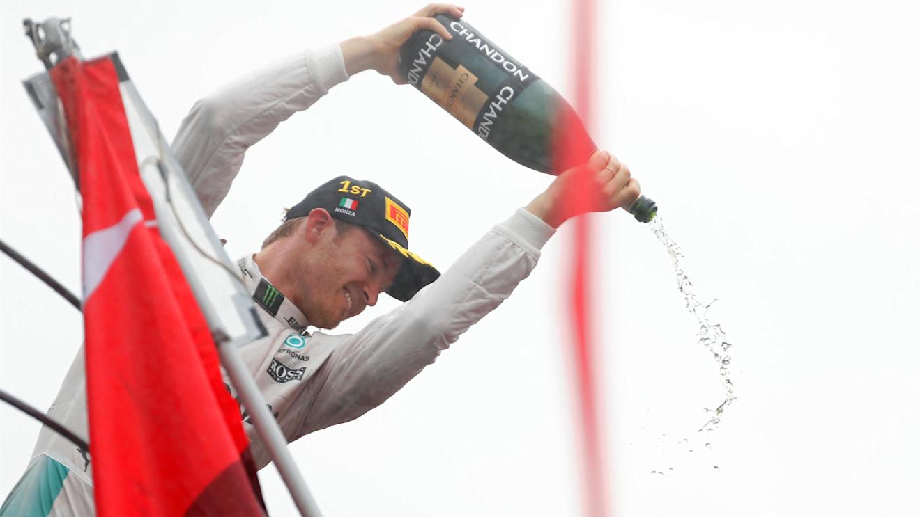 Race winner Nico Rosberg (GER) Mercedes AMG F1 celebrates on the podium with the champagne at Formula One World Championship, Rd14, Italian Grand Prix, Race, Monza, Italy, Sunday 4 September 2016. © Sutton Images