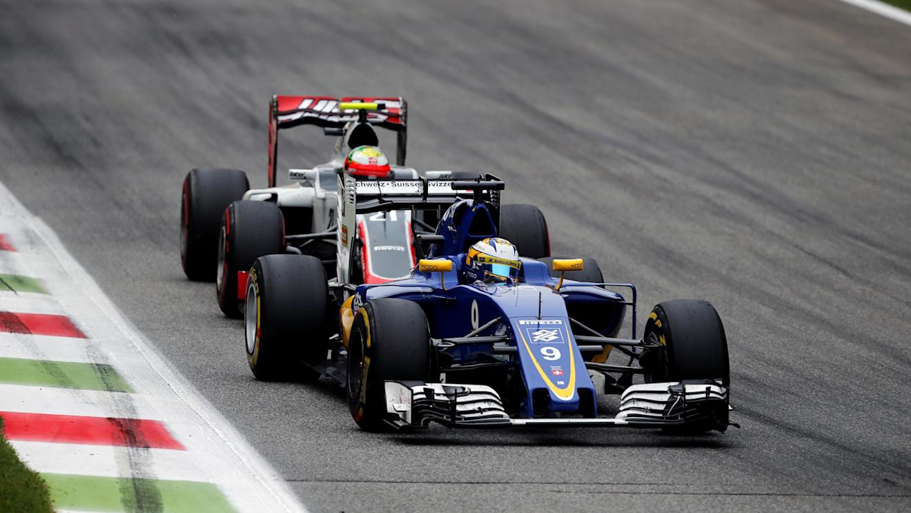 Marcus Ericsson (SWE) Sauber C35 and Esteban Gutierrez (MEX) Haas VF-16 battle for position at Formula One World Championship, Rd14, Italian Grand Prix, Race, Monza, Italy, Sunday 4 September 2016. © Sutton Images