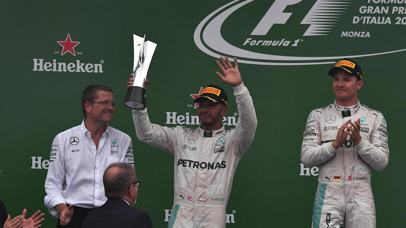 Lewis Hamilton (GBR) Mercedes AMG F1 celebrates on the podium with the trophy at Formula One World Championship, Rd14, Italian Grand Prix, Race, Monza, Italy, Sunday 4 September 2016. © Sutton Images