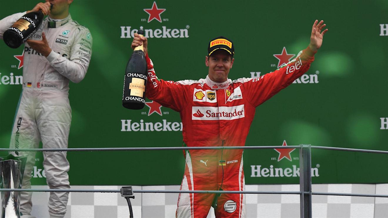 Sebastian Vettel (GER) Ferrari celebrates on the podium at Formula One World Championship, Rd14, Italian Grand Prix, Race, Monza, Italy, Sunday 4 September 2016. © Sutton Images