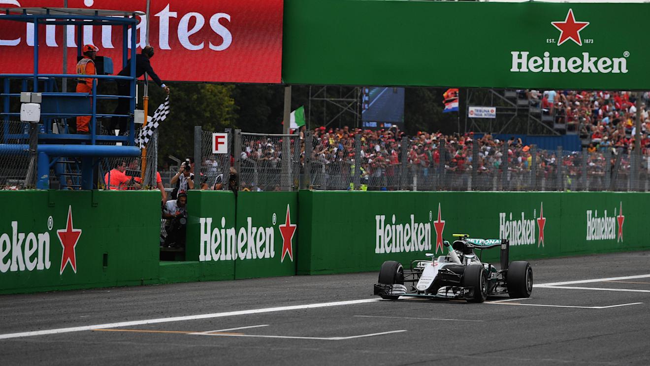 Race winner Nico Rosberg (GER) Mercedes-Benz F1 W07 Hybrid takes the chequered flag at Formula One World Championship, Rd14, Italian Grand Prix, Race, Monza, Italy, Sunday 4 September 2016. © Sutton Images