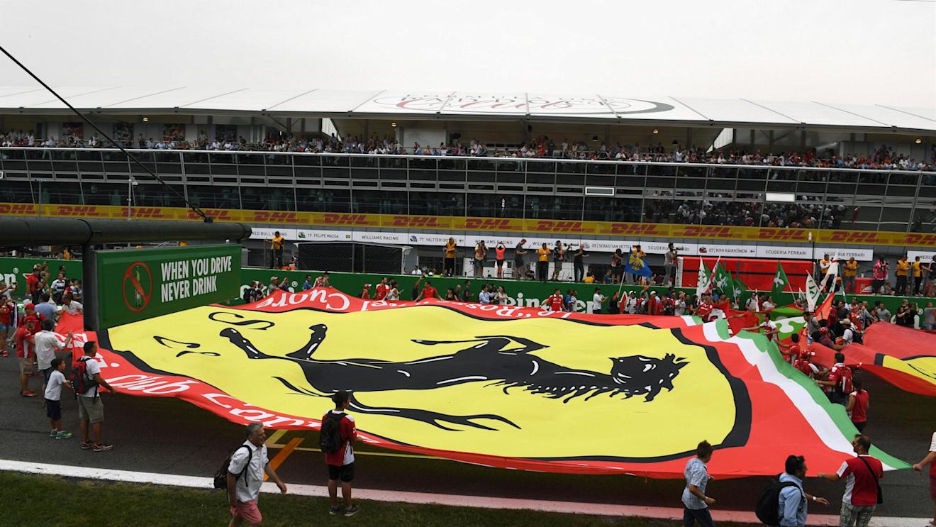 Fans and giant Ferrari flag on track at Formula One World Championship, Rd14, Italian Grand Prix, Race, Monza, Italy, Sunday 4 September 2016. © Sutton Images