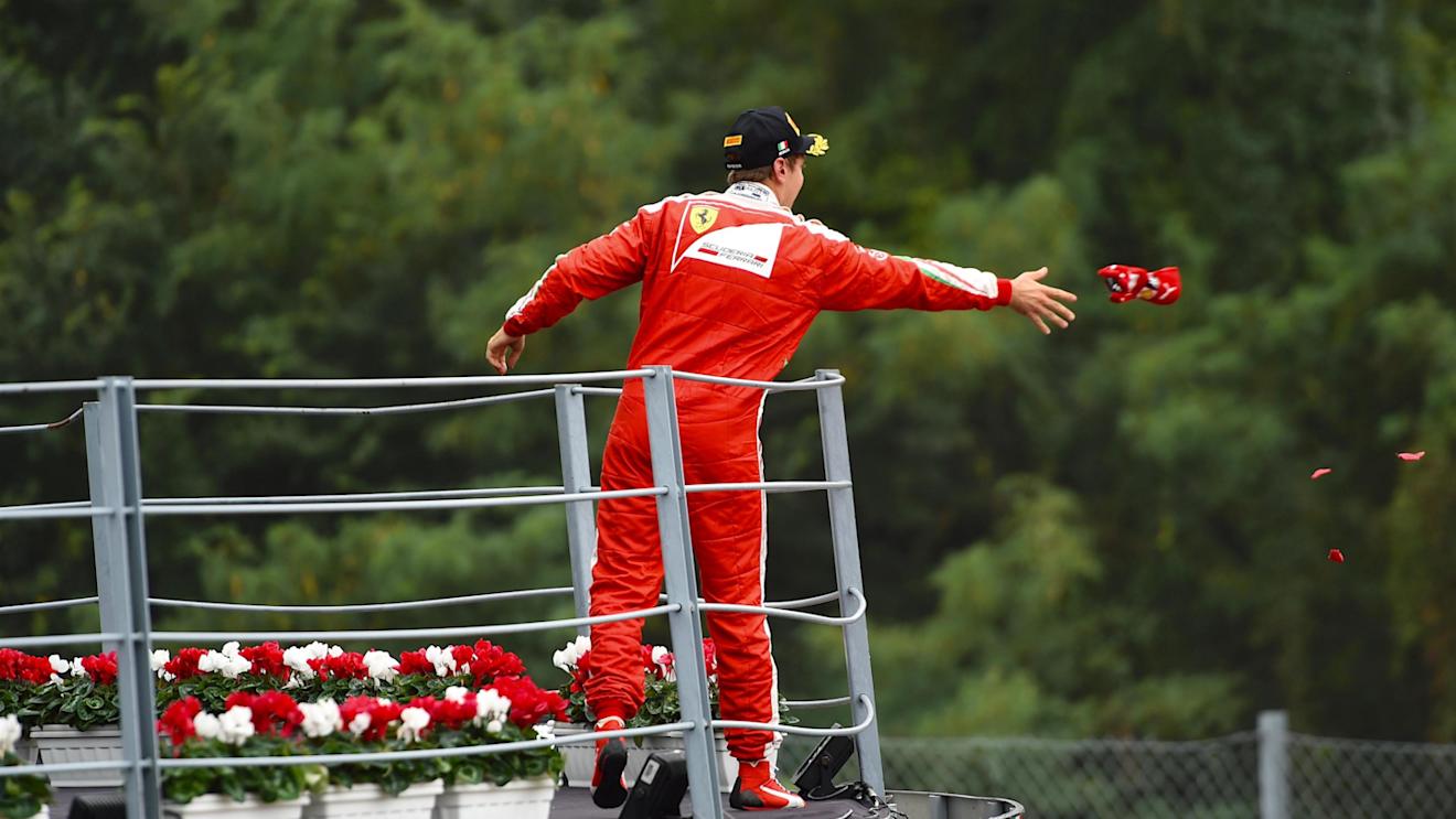Sebastian Vettel (GER) Ferrari celebrates on the podium and throws his cap at Formula One World Championship, Rd14, Italian Grand Prix, Race, Monza, Italy, Sunday 4 September 2016. © Sutton Images