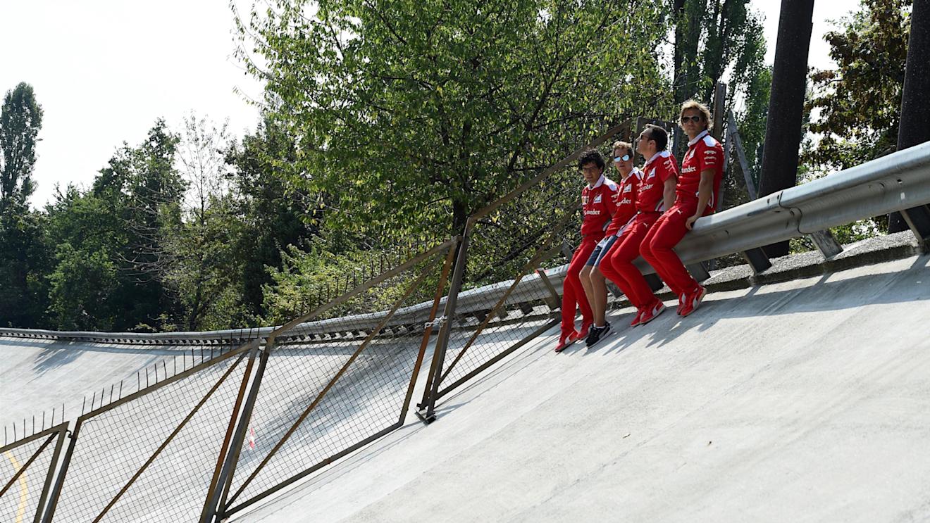 Sebastian Vettel (GER) Ferrari on the old track banking with Riccardo Adami (ITA) Ferrari Race Engineer and Antti Kontsas (FIN) trainer at Formula One World Championship, Rd14, Italian Grand Prix, Preparations, Monza, Italy, Thursday 1 September 2016. © Sutton Images