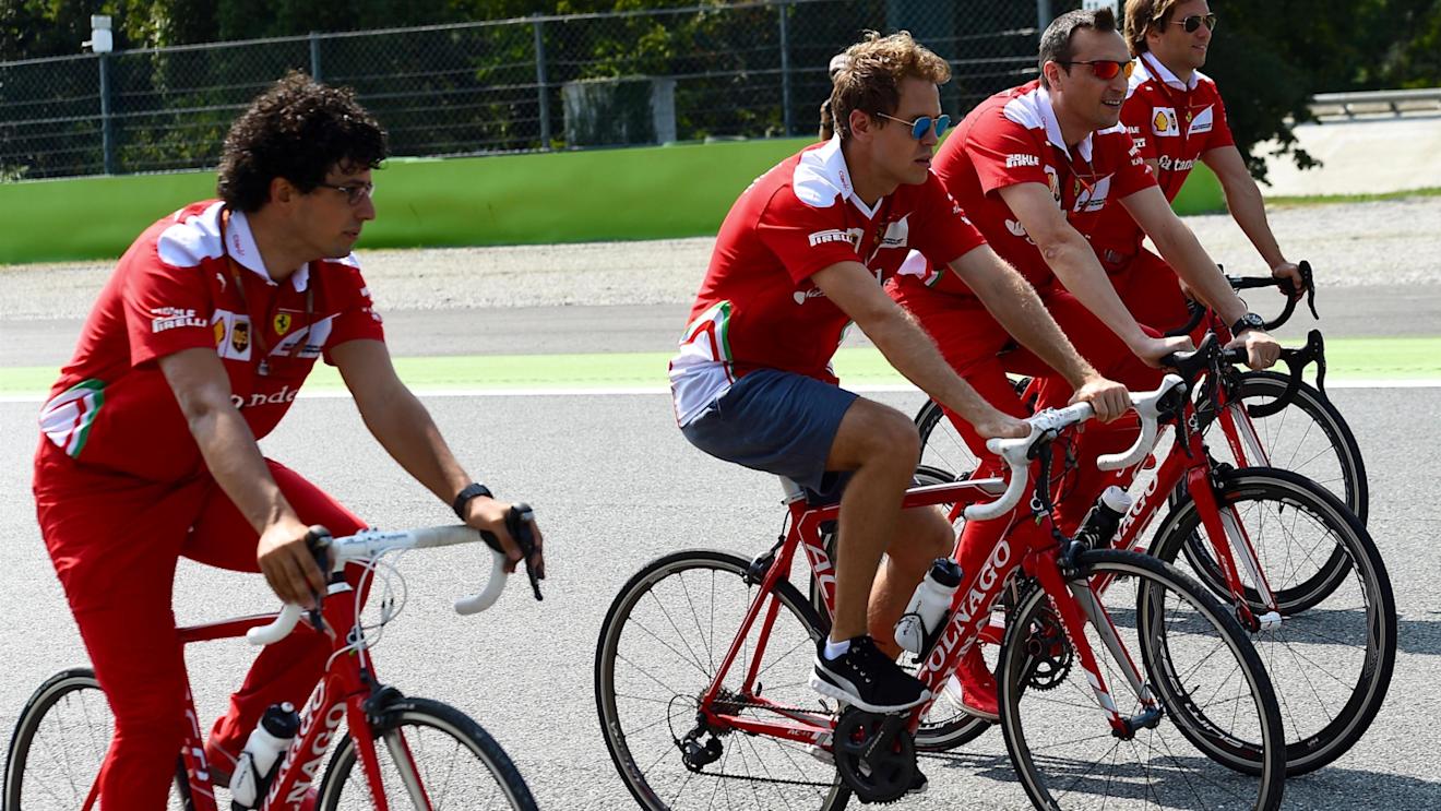 Sebastian Vettel (GER) Ferrari rides the track on a bike with Riccardo Adami (ITA) Ferrari Race Engineer and Antti Kontsas (FIN) trainer at Formula One World Championship, Rd14, Italian Grand Prix, Preparations, Monza, Italy, Thursday 1 September 2016. © Sutton Images