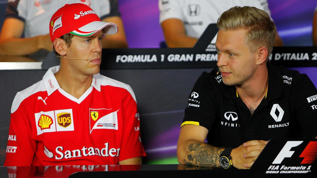 Sebastian Vettel (GER) Ferrari and Kevin Magnussen (DEN) Renault Sport F1 Team in the Press Conference at Formula One World Championship, Rd14, Italian Grand Prix, Preparations, Monza, Italy, Thursday 1 September 2016. © Sutton Images