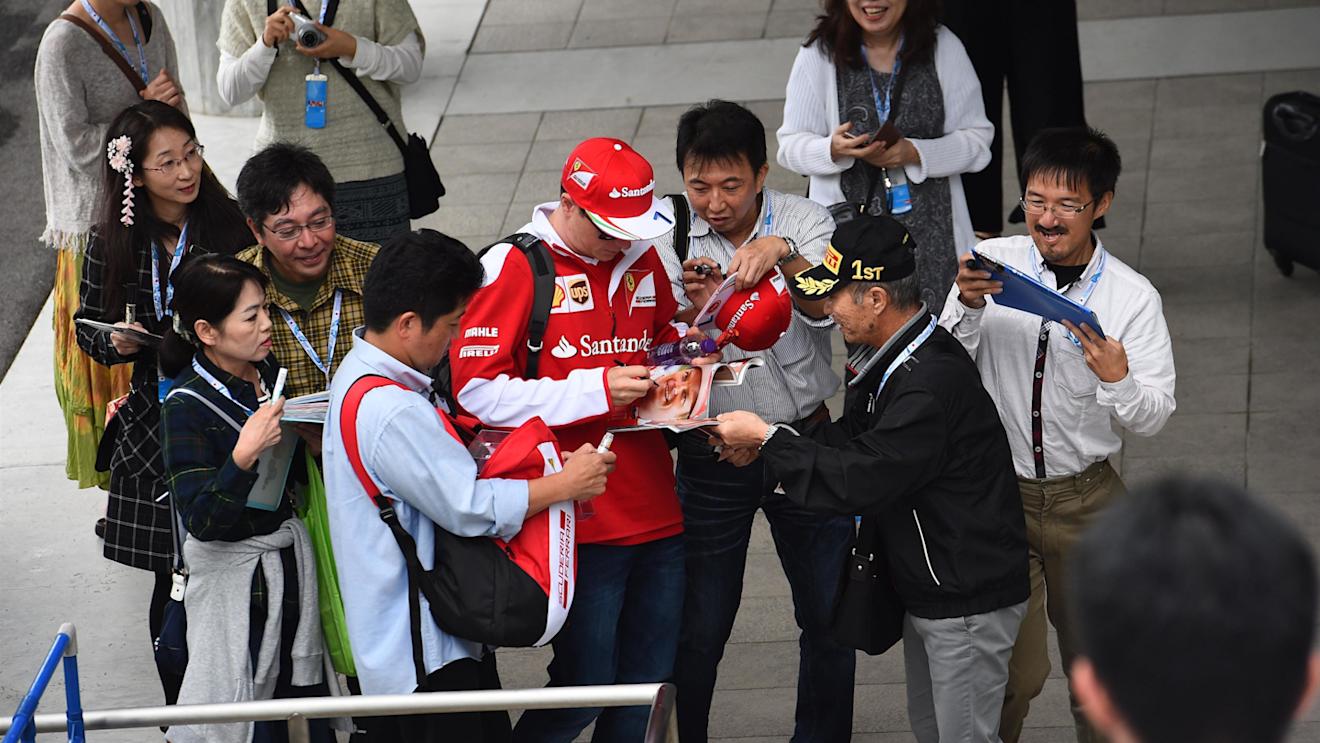 Kimi Raikkonen (FIN) Ferrari signs autographs for the fans at Formula One World Championship, Rd17, Japanese Grand Prix, Qualifying, Suzuka, Japan, Saturday 8 October 2016. © Sutton Images