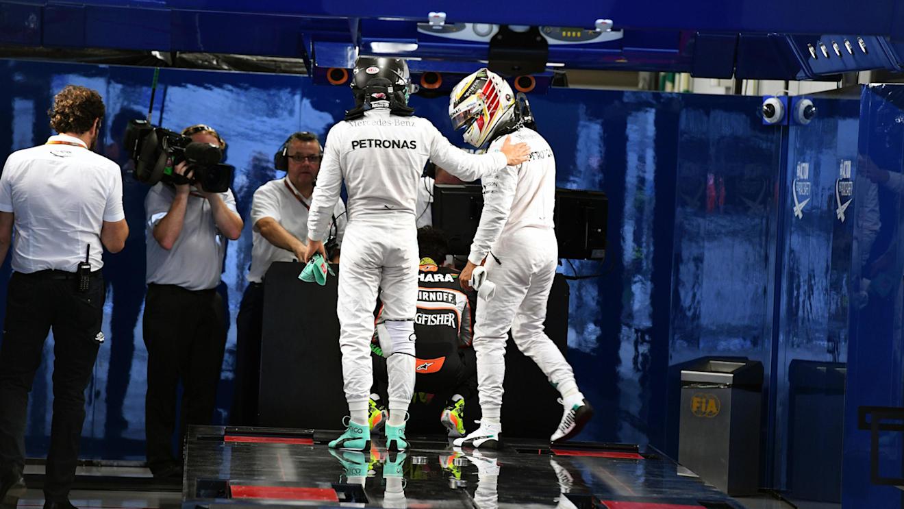 Pole sitter Lewis Hamilton (GBR) Mercedes AMG F1 and Nico Rosberg (GER) Mercedes AMG F1 in parc ferme at Formula One World Championship, Rd17, Japanese Grand Prix, Qualifying, Suzuka, Japan, Saturday 8 October 2016. © Sutton Images