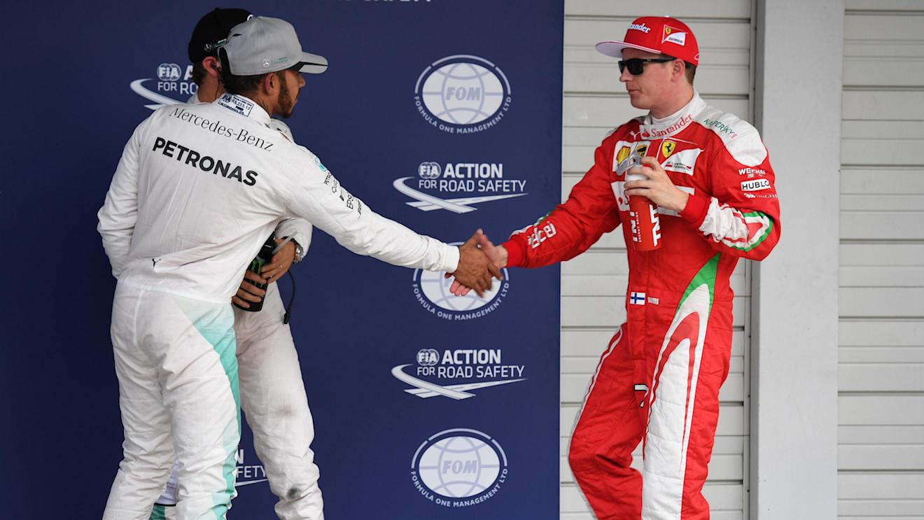 Lewis Hamilton (GBR) Mercedes AMG F1 and Kimi Raikkonen (FIN) Ferrari celebrate in parc ferme at Formula One World Championship, Rd17, Japanese Grand Prix, Qualifying, Suzuka, Japan, Saturday 8 October 2016. © Sutton Images