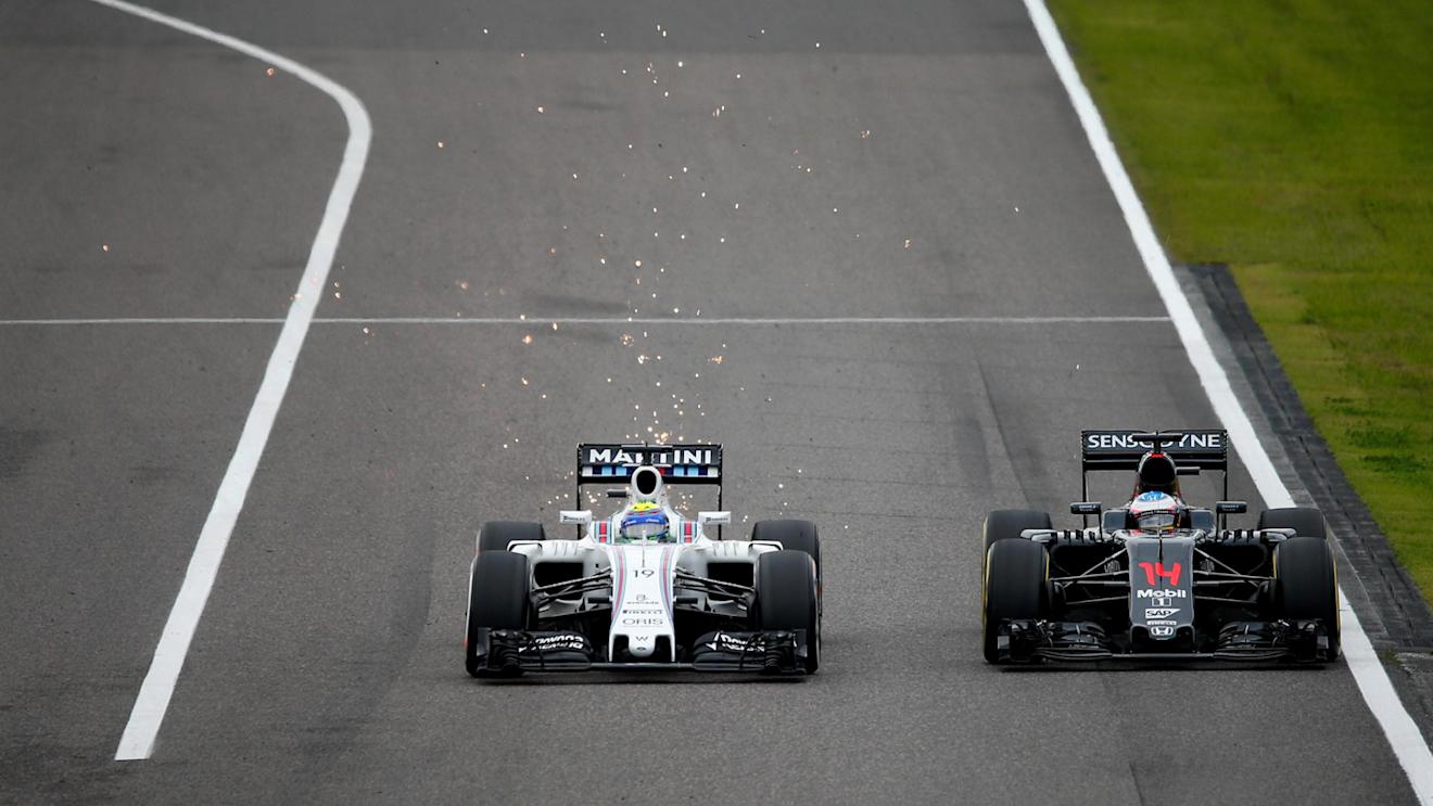 Felipe Massa (BRA) Williams FW38 and Fernando Alonso (ESP) McLaren MP4-31 at Formula One World Championship, Rd17, Japanese Grand Prix, Race, Suzuka, Japan, Sunday 9 October 2016. © Sutton Images