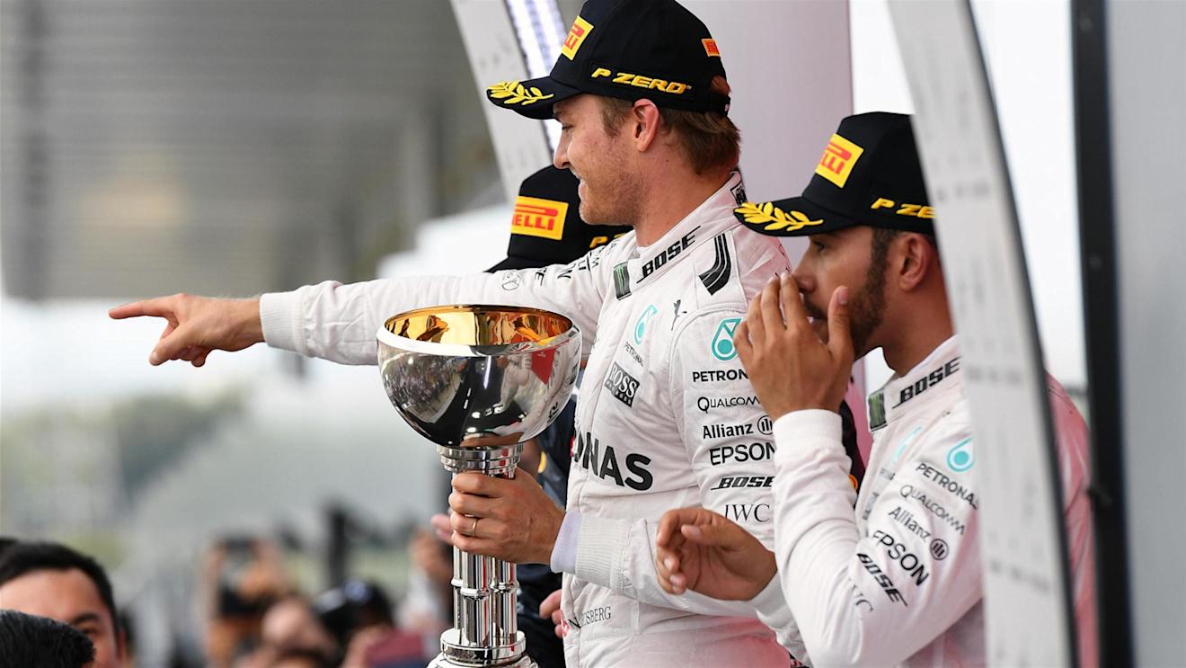 Race winner Nico Rosberg (GER) Mercedes AMG F1 celebrates on the podium with the trophy at Formula One World Championship, Rd17, Japanese Grand Prix, Race, Suzuka, Japan, Sunday 9 October 2016. © Sutton Images