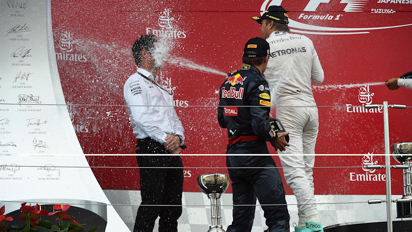 Nico Rosberg (GER) Mercedes AMG F1, Max Verstappen (NED) Red Bull Racing and Andy Shovlin (GBR) Mercedes AMG F1 Chief Engineer celebrate on the podium with the champagne at Formula One World Championship, Rd17, Japanese Grand Prix, Race, Suzuka, Japan, Sunday 9 October 2016. © Sutton Images